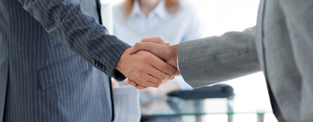 Close-up of businessmen shaking hands
